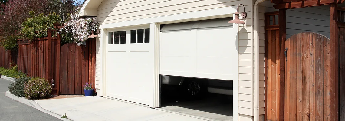 Fix Metal Garage Door Jerking in Des Plaines, Illinois